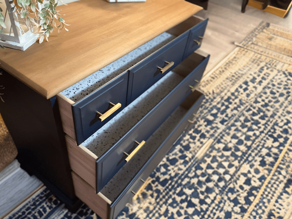 Blue dresser with gold handles 