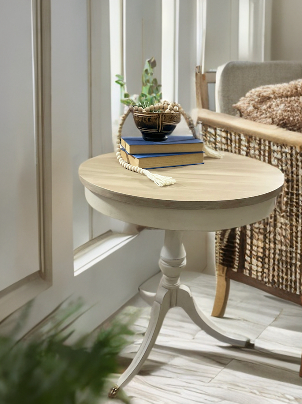 table styled with books and plant 