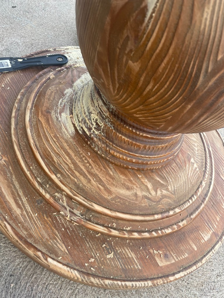 scraping leg of round table 